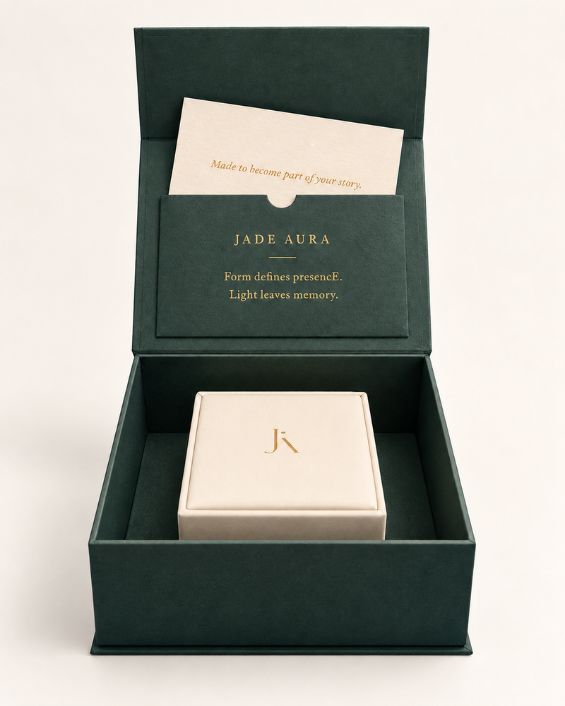 Jade Aura gift packaging with a green outer box, jewellery box and branded card